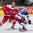 OSTRAVA, CZECH REPUBLIC - MAY 6: Denmark's Oliver Lauridsen #25 battles for position with Russia's Yevgeni Dadonov #63 during preliminary round action at the 2015 IIHF Ice Hockey World Championship. (Photo by Richard Wolowicz/HHOF-IIHF Images)

